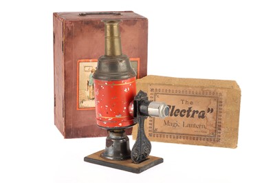 Lot 370 - An 'Elecrta' Children's Tin Plate Magic Lantern