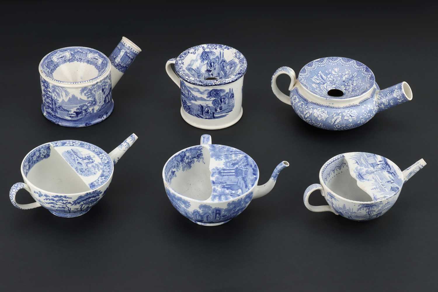Lot 64 - A Group of Blue and White Earthenware Spittoons and Feeding Cups