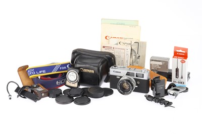 Lot 317 - A Canon Canonet QL19 35mm Rangefinder Camera, and Canon Accessories