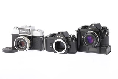 Lot 132 - A pair of Nikon EM SLR Cameras