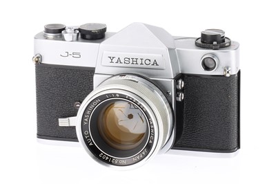 Lot 228 - A Yashica J-5 35mm SLR Camera and "Tomioka" lens