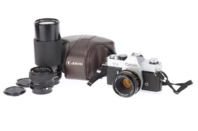 Lot 302 - A Canon TX 35mm SLR Camera Outfit