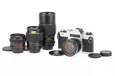 Lot 543 - A Chinon CX 35mm SLR Camera Outfit