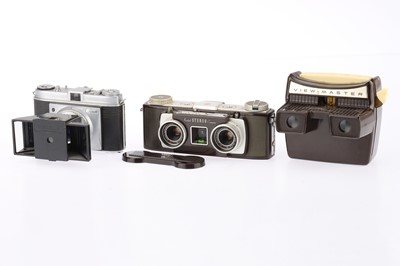 Lot 296 - A Pair of Kodak Stereo 35mm Film Cameras