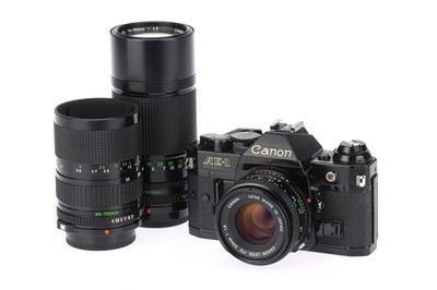 Lot 314 - A Canon AE-1 35mm SLR Camera Outfit