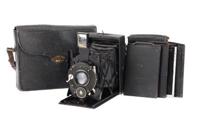 Lot 504 - An Adams Vesta Folding Film Plate Camera Cased Outfit