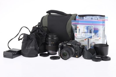 Lot 514 - A Panasonic Lumix DMC-G2 Mirrorless Camera and Lenses