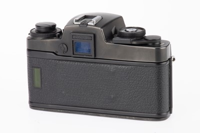 Lot 57 - A Leica R4 35mm SLR Camera Body, Data Back and Motor Drive