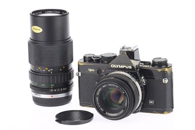 Lot 628 - An Olympus OM2N 35mm SLR Camera