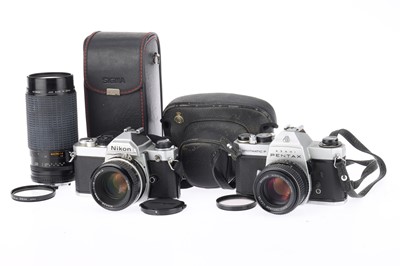 Lot 193 - A Nikon FM 35mm SLR Camera Outfit, and a Spotmatic F.