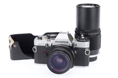 Lot 133 - An Olympus OM10 35mm Camera Outfit