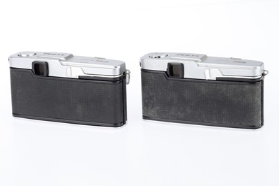Lot 580 - A Pair of Olympus Pen-FT Film Camera Outfits