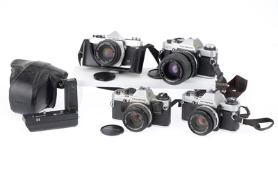 Lot 138 - A Group of Olympus OM 35mm SLR Cameras