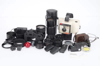 Lot 216 - A Selection of 35mm Lenses and Photographica