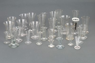 Lot 711 - A Large Collection of Apothecary Chemists Glass Measures