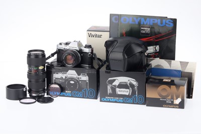 Lot 108 - An Olympus OM-10 SLR Film Camera Outfit