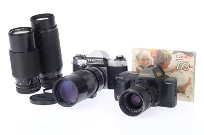 Lot 86 - A Canon T70 35mm SLR Camera Outfit