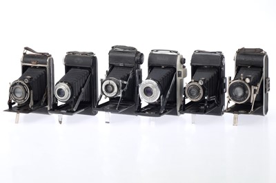 Lot 214 - A Selection of Folding Medium Format Cameras