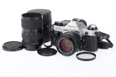 Lot 84 - A Canon AE-1 35mm SLR Camera Outfit