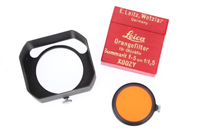 Lot 11 - A Leitz Wetzlar Summarit Lens Hood and Orange Filter