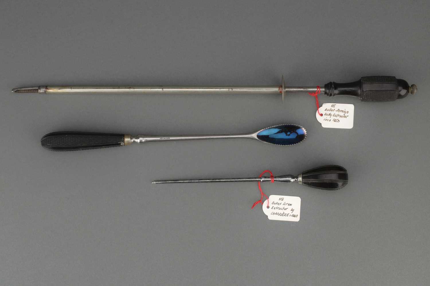 Lot 35 - Three Bullet Extractors,