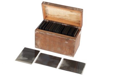 Lot 587 - Collection of half plate glass negatives in...