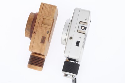 Lot 90 - A Canon Dial 35-2 Half Frame Camera and Wooden Model
