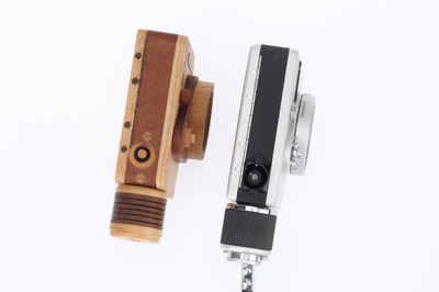 Lot 90 - A Canon Dial 35-2 Half Frame Camera and Wooden Model