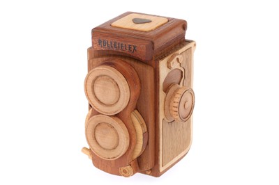 Lot 457 - A Wooden Model of a Rolleiflex Baby 4x4 Camera