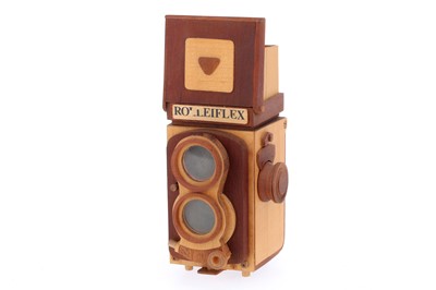 Lot 458 - A Wooden Model of a Rolleiflex Baby 4x4 Camera