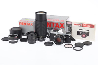 Lot 141 - A Pentax ME Super SLR Camera Outfit