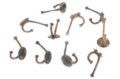 Lot 793 - A Collection of 10 Art & Crafts Brass Coat Hooks