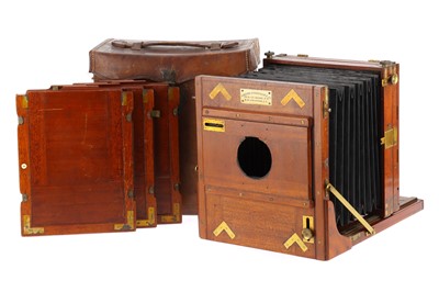 Lot 434 - A London Stereoscopic Co. Full Plate Mahogany & Brass Folding Bed Camera