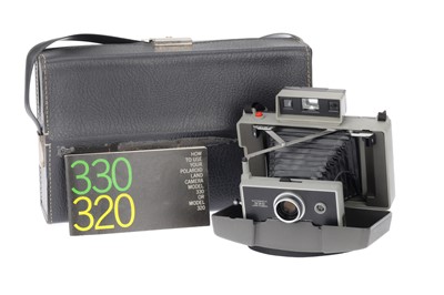 Lot 141 - A Polaroid 330 Land Camera