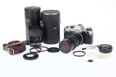 Lot 88 - An Olympus OM-10 35mm SLR Camera Outfit