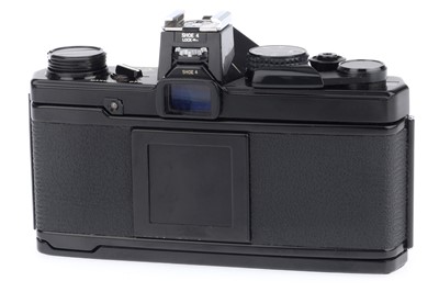 Lot 76 - An Olympus OM-2N MD 35mm SLR Camera Outfit
