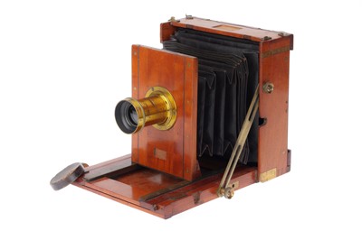 Lot 133 - A Mahogany and Brass Hand and Stand Camera