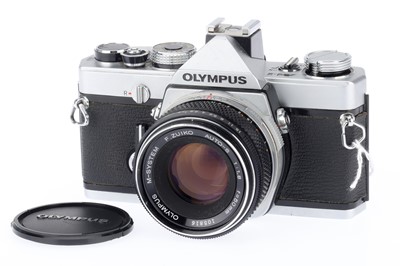 Lot 153 - An Olympus M-1 SLR Camera