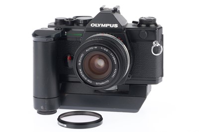 Lot 152 - An Olympus OM-2 Spot/Program 35mm SLR Camera