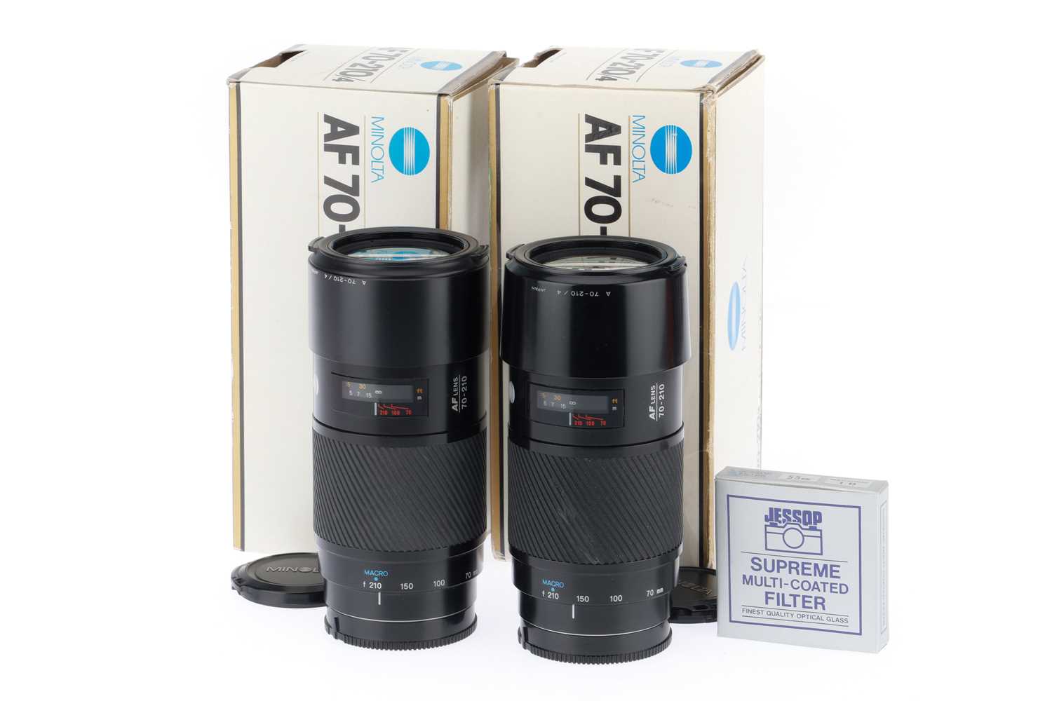 Lot 236 A Pair Of Minolta AF F 4 70 210mm Beercan lot-236-a-pair-of-minolta-af-f-4-70-210mm-beercan