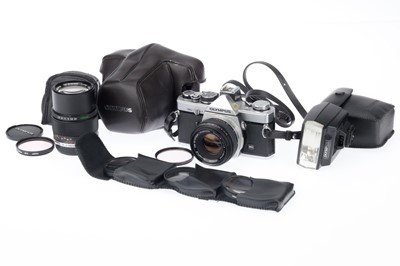 Lot 134 - An Olympus OM-2 MD Camera Outfit