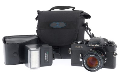 Lot 34 - A Minolta XE-1 35mm SLR Camera Outfit