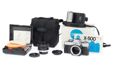 Lot 35 - A Minolta X-500 35mm SLR Camera Outfit