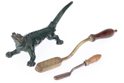 Lot 418 - A Crocodile Cork Press