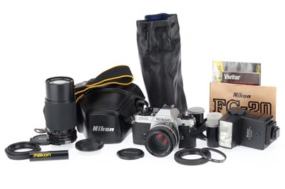 Lot 26 - A Nikon FG-20 35mm SLR Camera Outfit