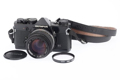 Lot 142 - An Olympus OM-1N 35mm SLR Camera