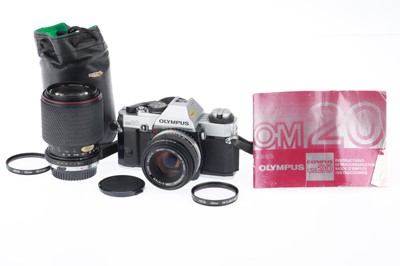 Lot 141 - An Olympus OM20 35mm SLR Camera