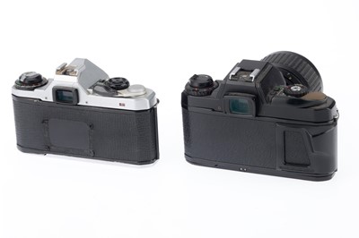 Lot 143 - A Pair of Pentax SLR Cameras