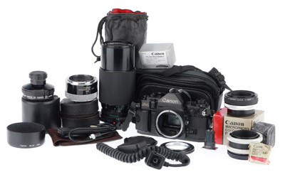 Lot 130 - A Canon A-1 35mm SLR Camera and Accessories