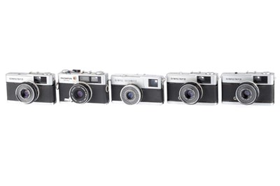 Lot 82 - Five Olympus 35mm Cameras